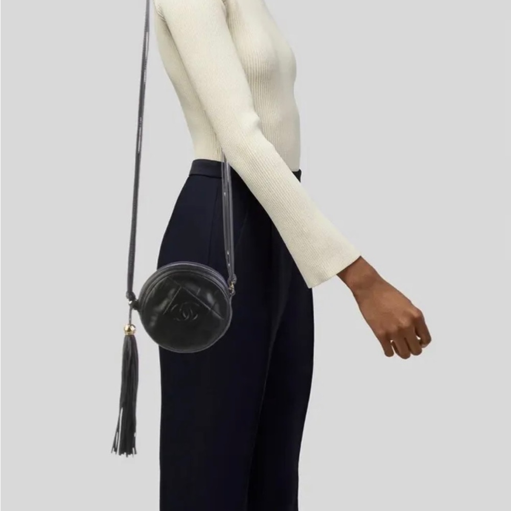 CHANEL mini round tassel bag